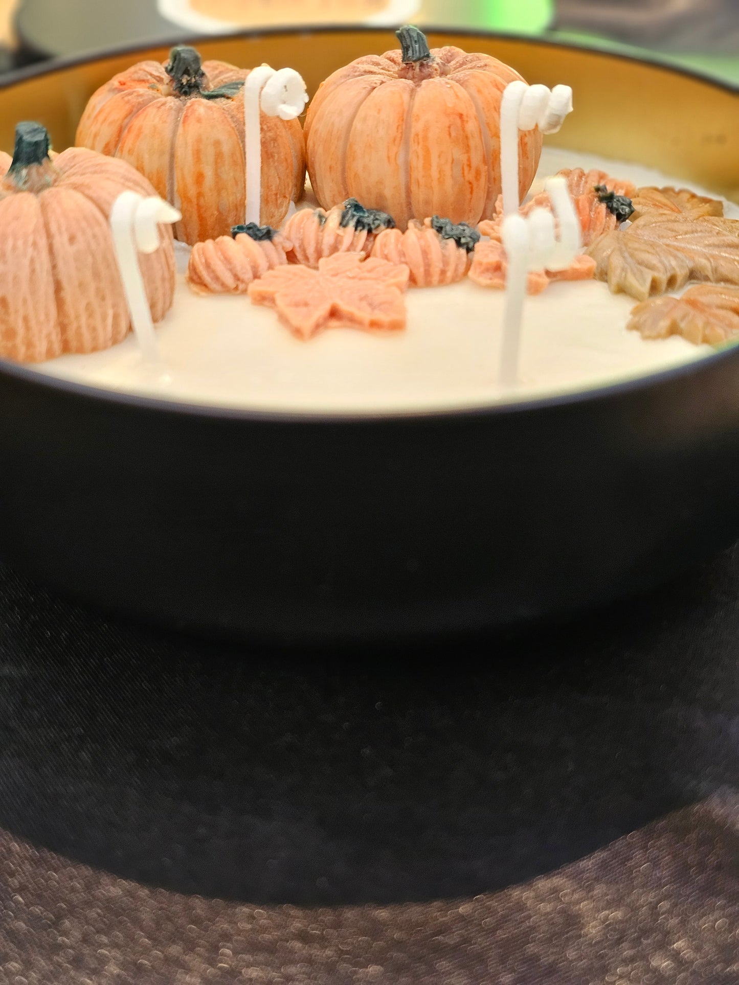 Limited Edition Pumpkin Field 4-wicks Luxury Candle with waxed pumpkins and leaves