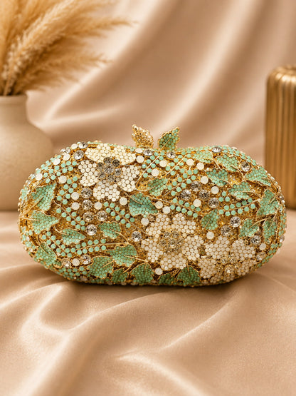 Decorative clutch bag with floral patterns on a beige fabric background